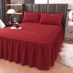 Bright red bed skirt, one-piece princess-style wedding bed sheet with skirt and apron cover. Bright red bed skirt, one-piece princess-style wedding bed sheet with skirt and apron cover.