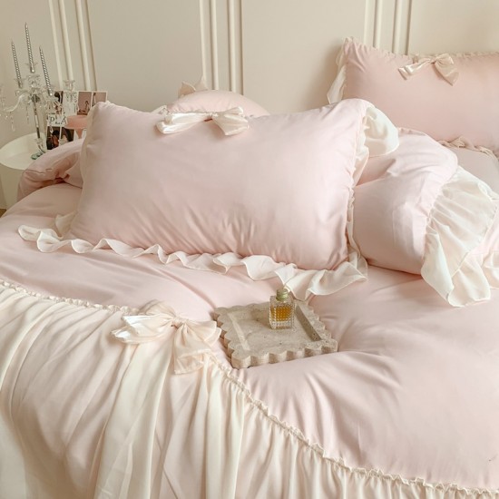 Korean solid color four-piece bed set, ultra-soft cotton quilt cover, non-slip sheets, lace pillowcases with bows Korean solid color four-piece bed set, ultra-soft cotton quilt cover, non-slip sheets, lace pillowcases with bows