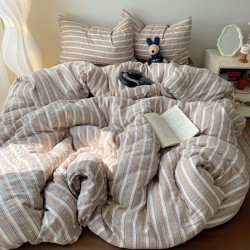 Simple colorful striped washed cotton four-piece bedding set, MUJI-style, ultra-soft waxed quilt cover, three-piece student bed sheet set. Simple colorful striped washed cotton four-piece bedding set, MUJI-style, ultra-soft waxed quilt cover, three-piece student bed sheet set.