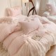 Korean solid color four-piece bed set, ultra-soft cotton quilt cover, non-slip sheets, lace pillowcases with bows Korean solid color four-piece bed set, ultra-soft cotton quilt cover, non-slip sheets, lace pillowcases with bows