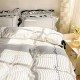 French cream princess-style four-piece bedding set with a white duvet cover, a light luxury, girly, premium bed skirt, washed cotton French cream princess-style four-piece bedding set with a white duvet cover, a light luxury, girly, premium bed skirt, washed cotton