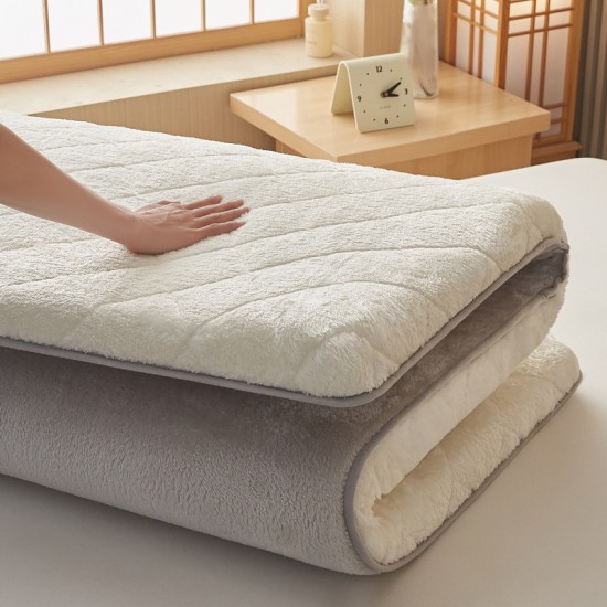 Thick winter milk fleece mattress with cushions for home use, plush sheets for student dormitories, plush mattress pads. Thick winter milk fleece mattress with cushions for home use, plush sheets for student dormitories, plush mattress pads.