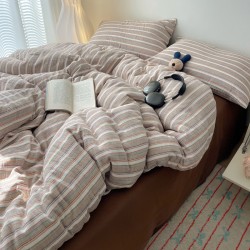 Simple colorful striped washed cotton four-piece bedding set, MUJI-style, ultra-soft waxed quilt cover, three-piece student bed sheet set. Simple colorful striped washed cotton four-piece bedding set, MUJI-style, ultra-soft waxed quilt cover, three-piece student bed sheet set.