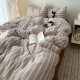 Simple colorful striped washed cotton four-piece bedding set, MUJI-style, ultra-soft waxed quilt cover, three-piece student bed sheet set. Simple colorful striped washed cotton four-piece bedding set, MUJI-style, ultra-soft waxed quilt cover, three-piece student bed sheet set.